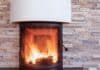 Nos idées déco pour installer un poêle à bois chez soi poele à bois noir sur pan de mur pierres